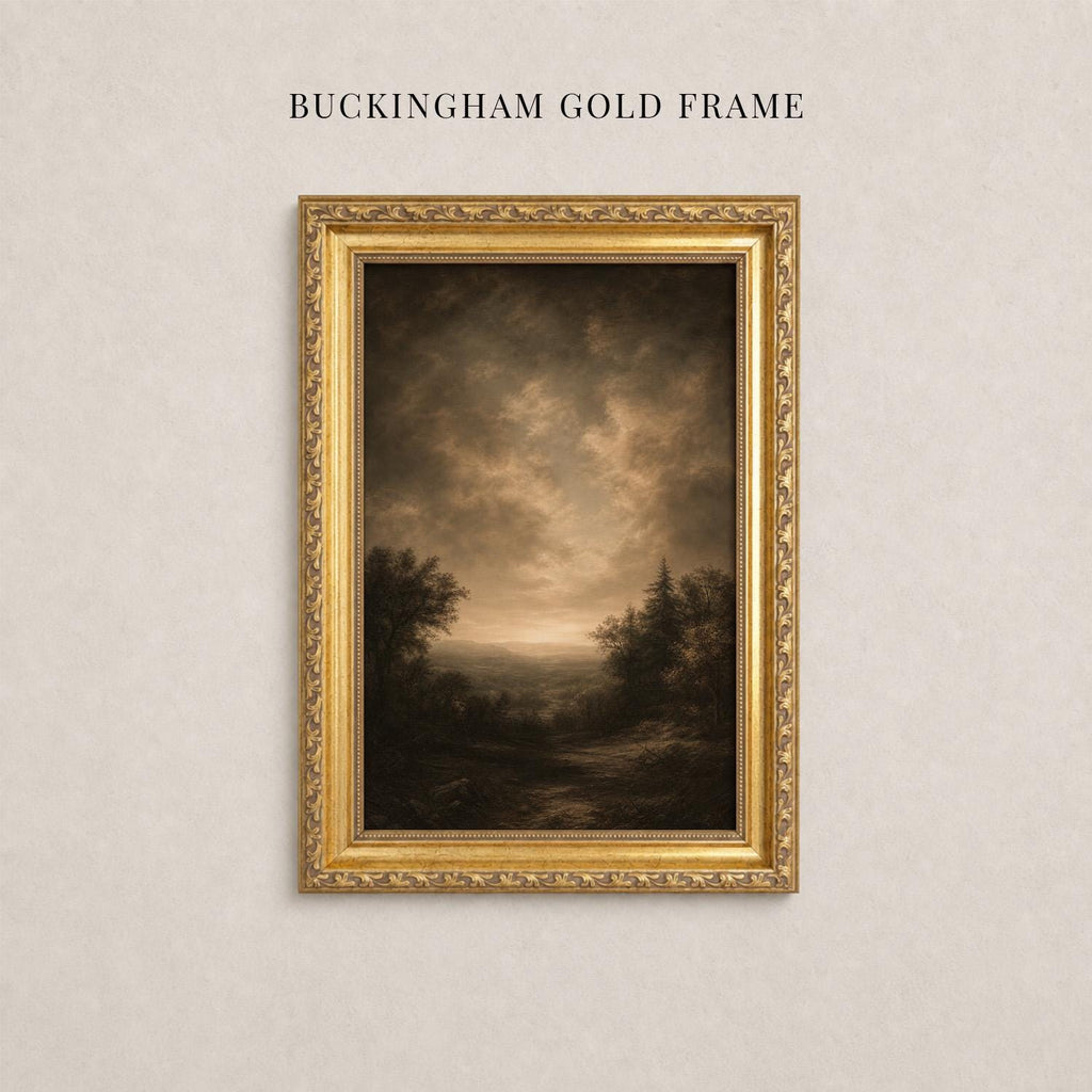 A painting of a landscape with trees and a cloudy sky is displayed in a gold-framed picture on a wall.
