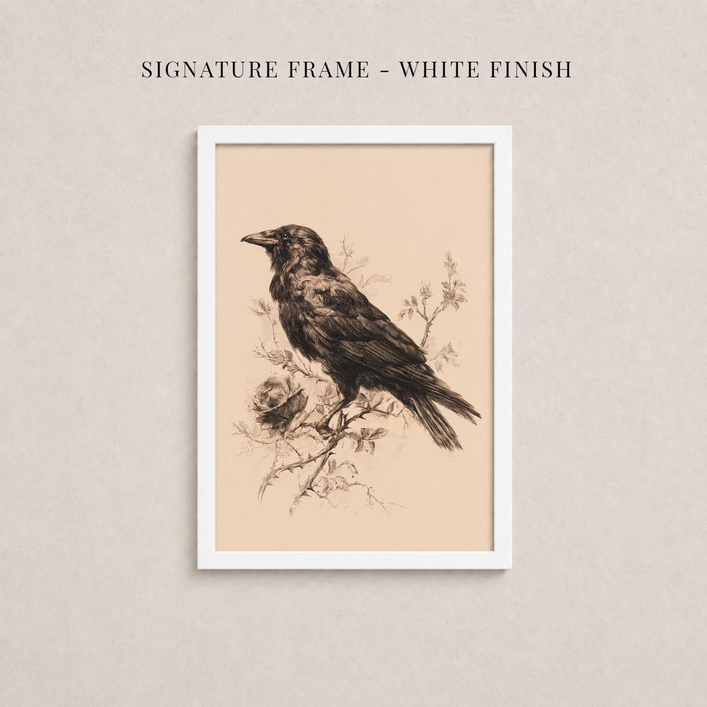 The image is a framed artwork depicting a black bird perched on a branch with flowers.