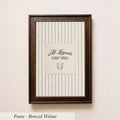 A framed picture of a baseball with the text "All Legends Start Small" displayed on it.