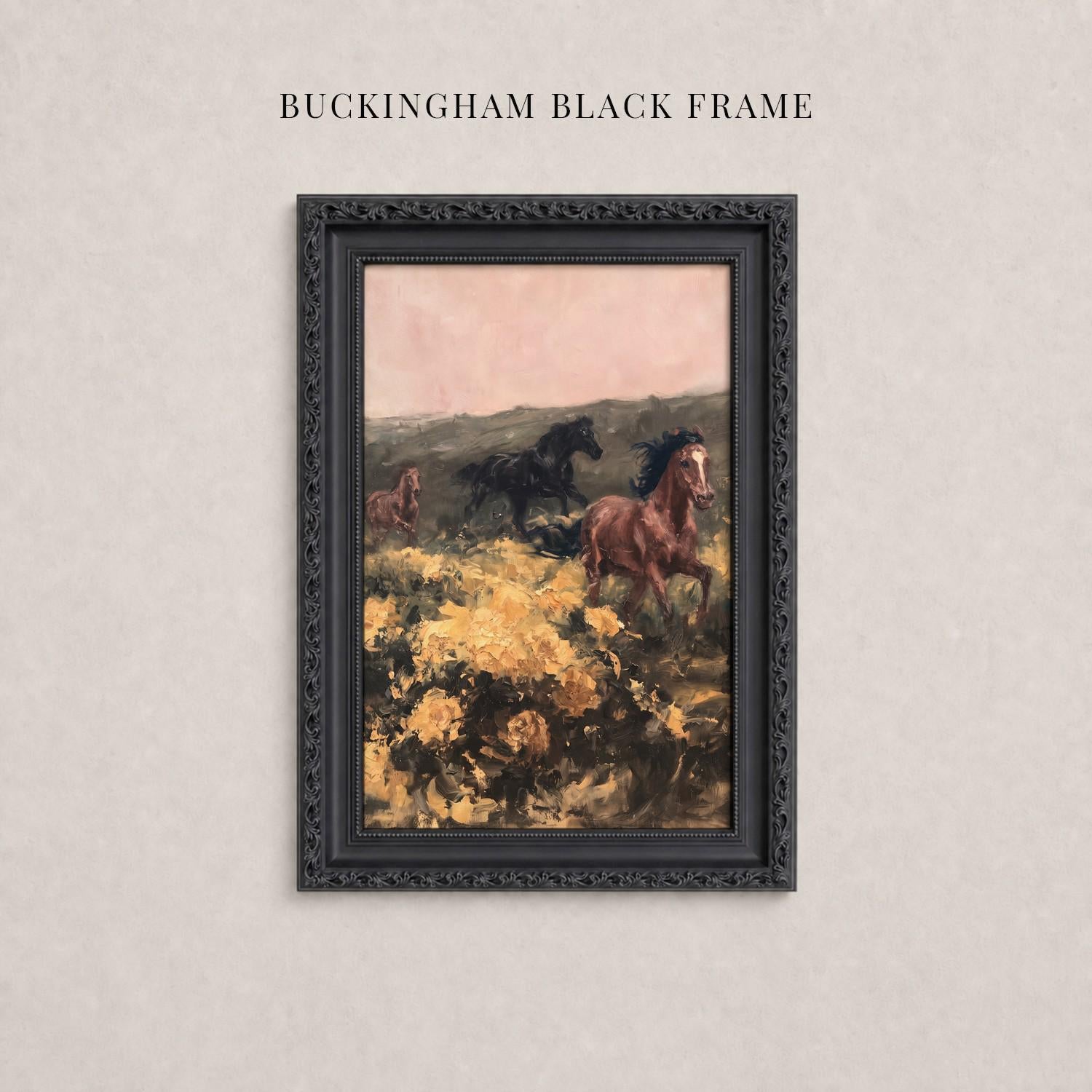 A framed painting depicting three horses galloping through a field with yellow flowers.